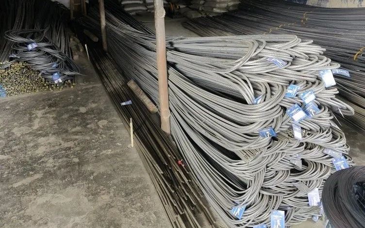 Bundles of TMT bars with mill tags at the Amrit Steels warehouse in City Market, Bangalore